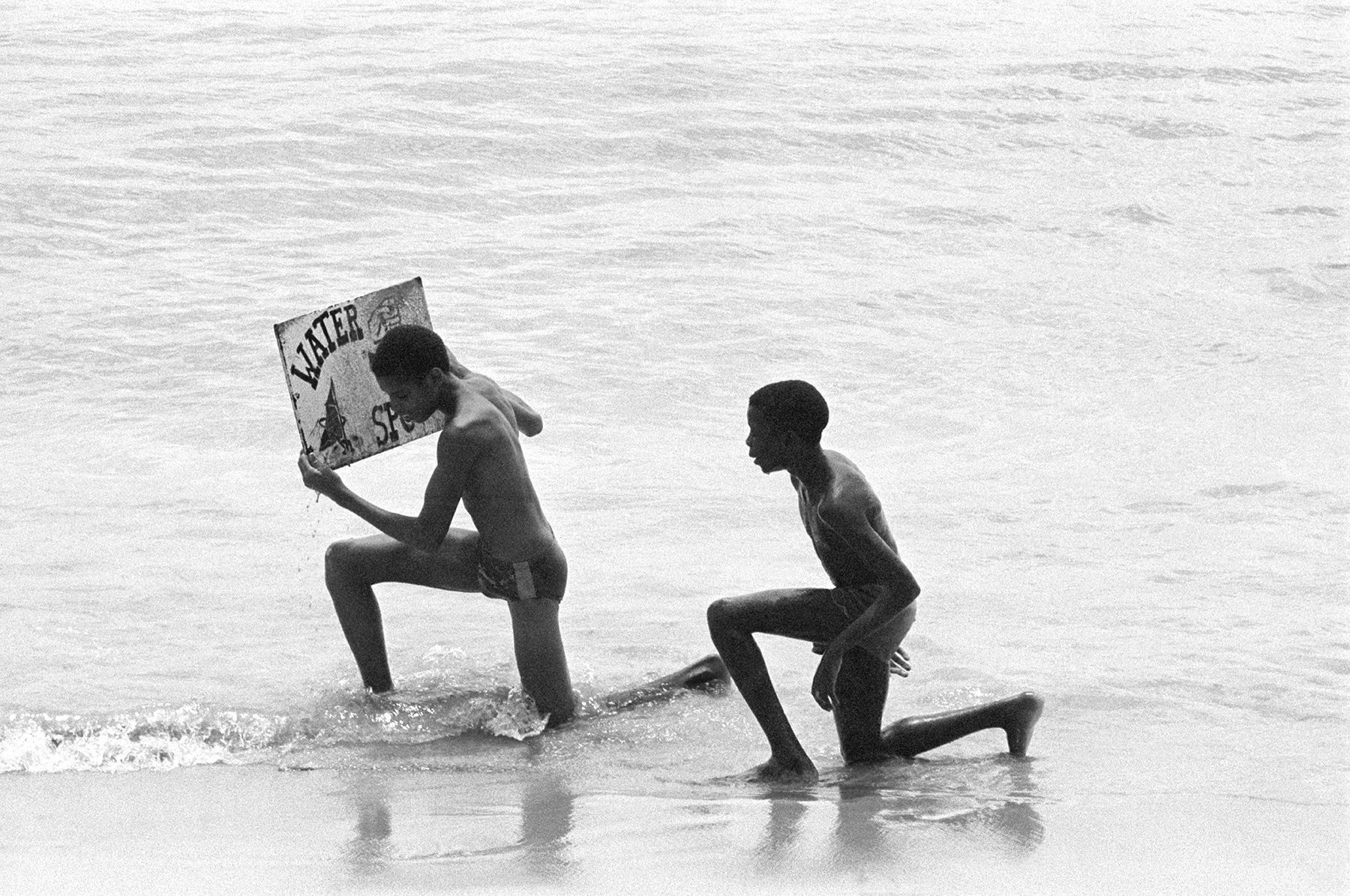 Photos by Francesca Phillips of boys playing on the beach in Barbados