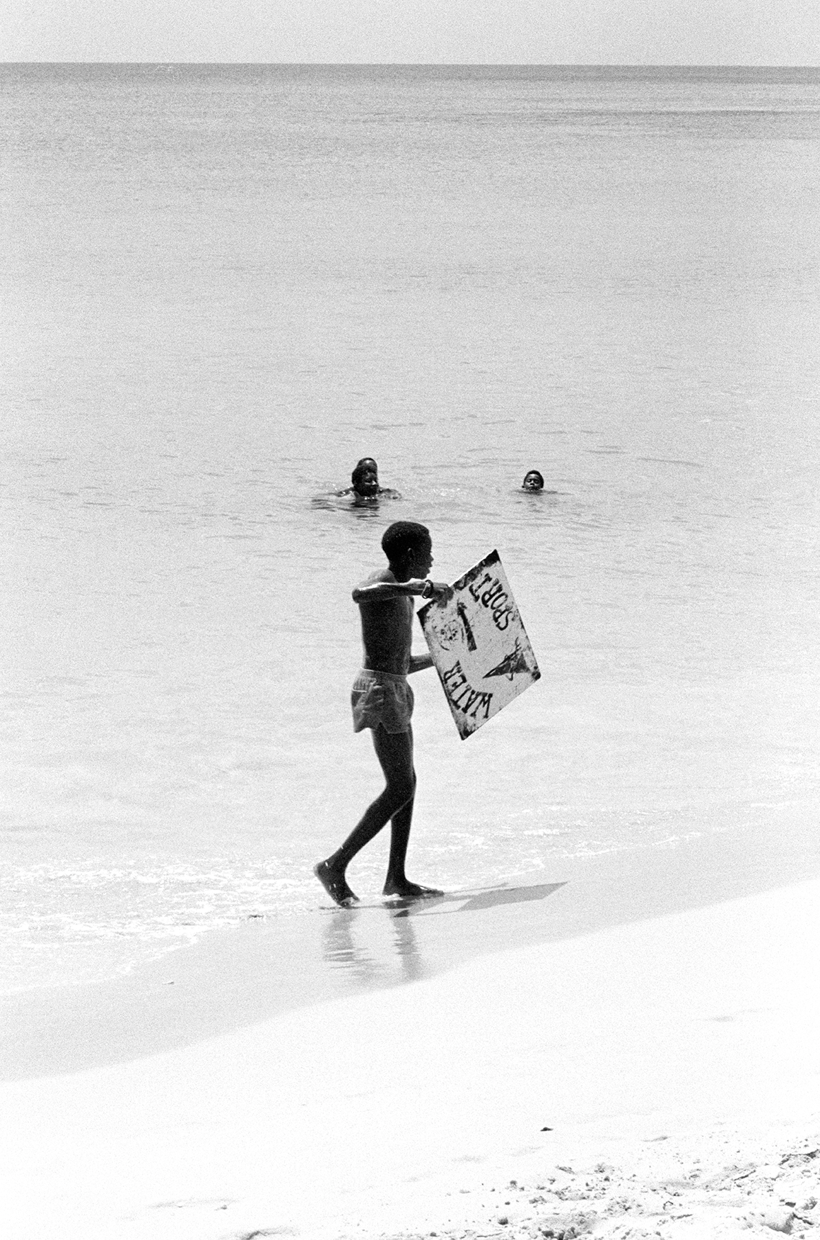 Photos by Francesca Phillips of boys playing on the beach in Barbados